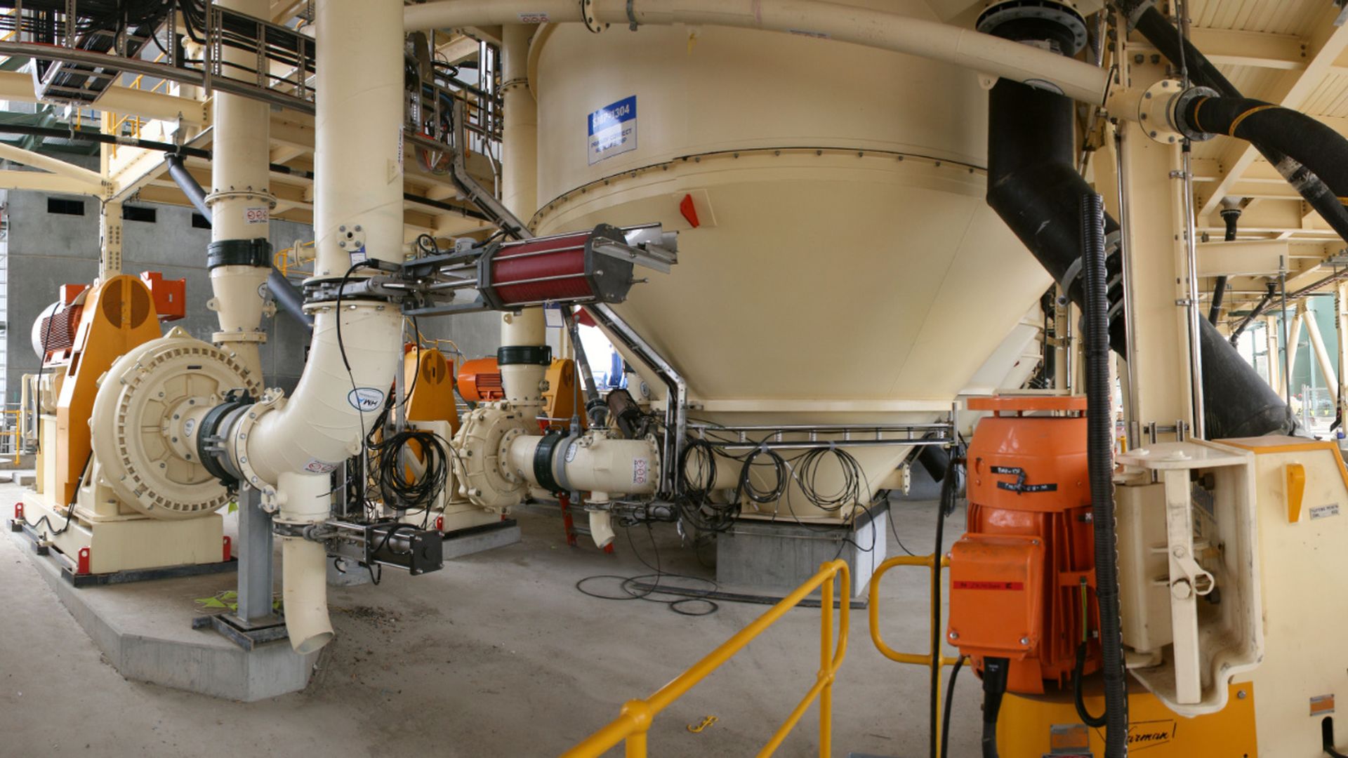 The interior of a large facility, filled with various mechanical and automated industrial devices