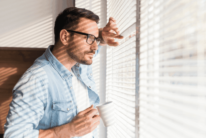 Service of process agent looking out of the window