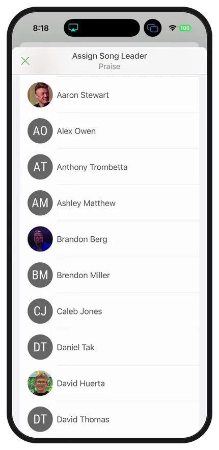 Phone screen displaying a list of potential song leaders with names and initials, titled "Assign Song Leader" under "Praise."