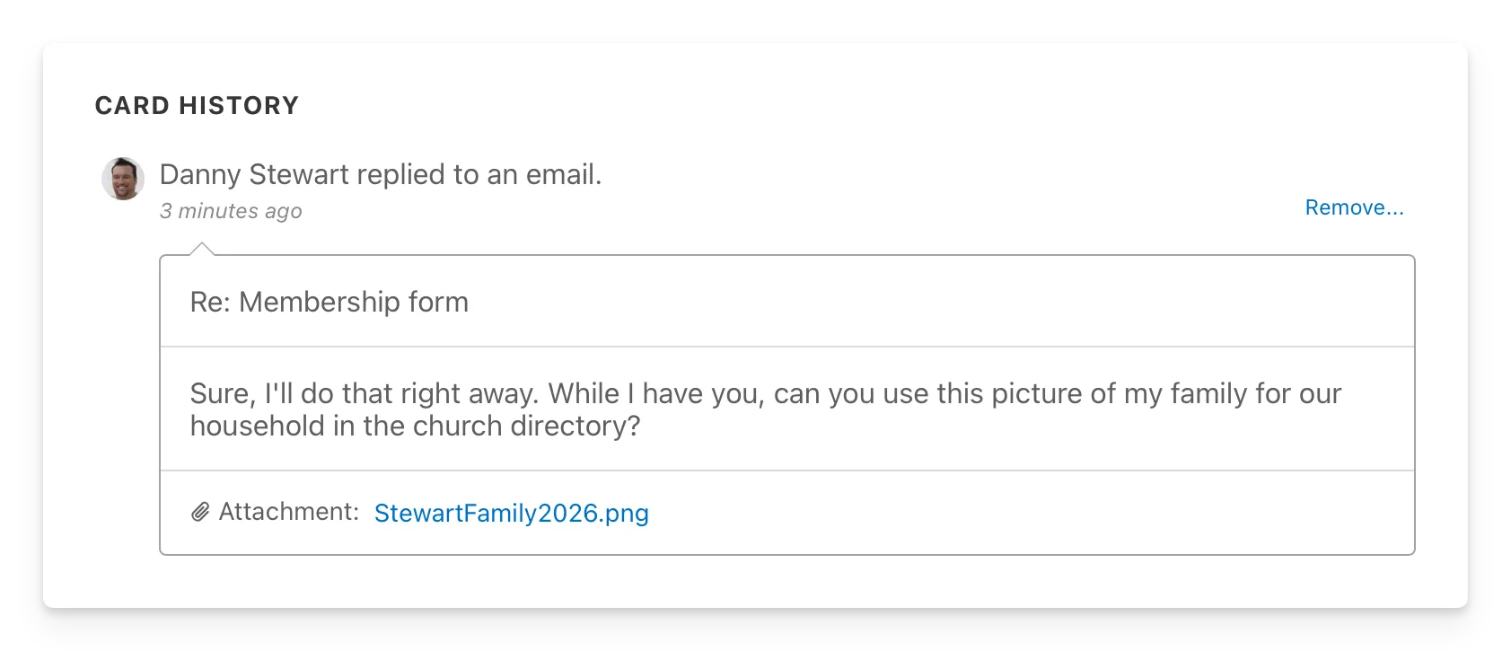An email reply in a workflow card with a file attached