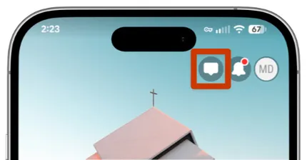 Smartphone screen showing a message icon highlighted, with a church roof background, two notification badges, and the time at 2:23 with a 67% battery.