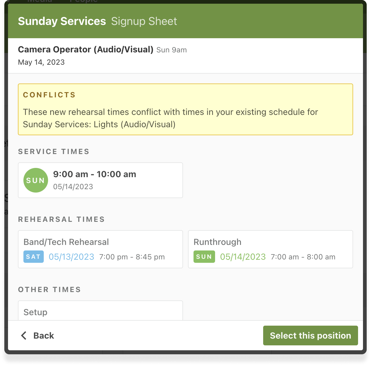 null A pop-up modal with volunteer serving times and schedule conflicts.
