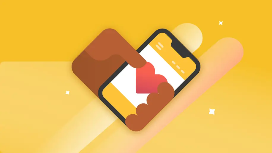 A hand holding a mobile phone with a heart in the middle of the screen.