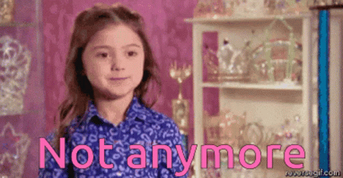 null A gif of a toddler girl with her hair parted in the middle cheesing mischievously and the words