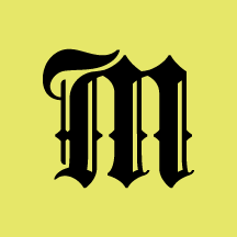 A black Gothic-style letter "M" on a yellow background. Maker and Made Logo.