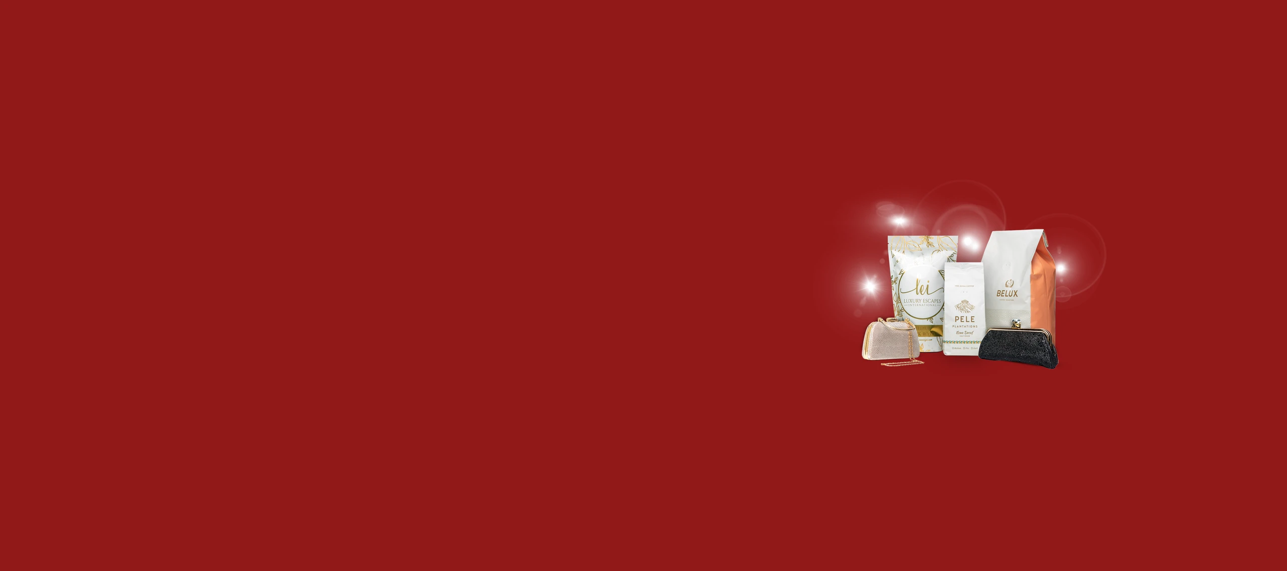 Coffee packaging and luxury clutches displayed on a deep red background, highlighted by camera flashes.