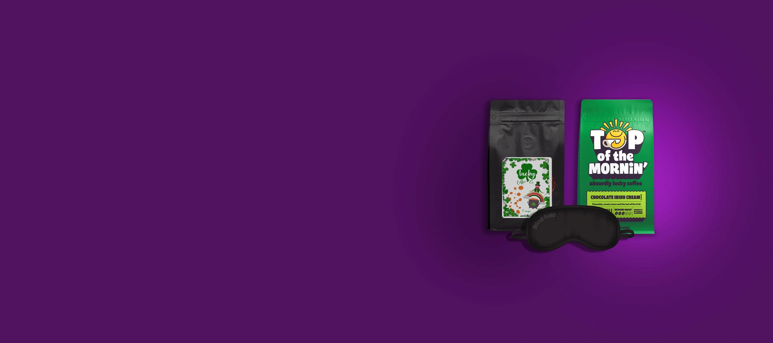 Flat Bottom coffee bags, one blank black with a label and another custom-printed bag with "Top of the Mornin." A black sleep mask is propped against the bags against a dark purple background.