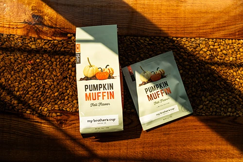 My Brother's Cup Custom Gusset Bag and Custom Flat Pouch on a coffee table, "Pumpkin Muffin Fall Flavor"