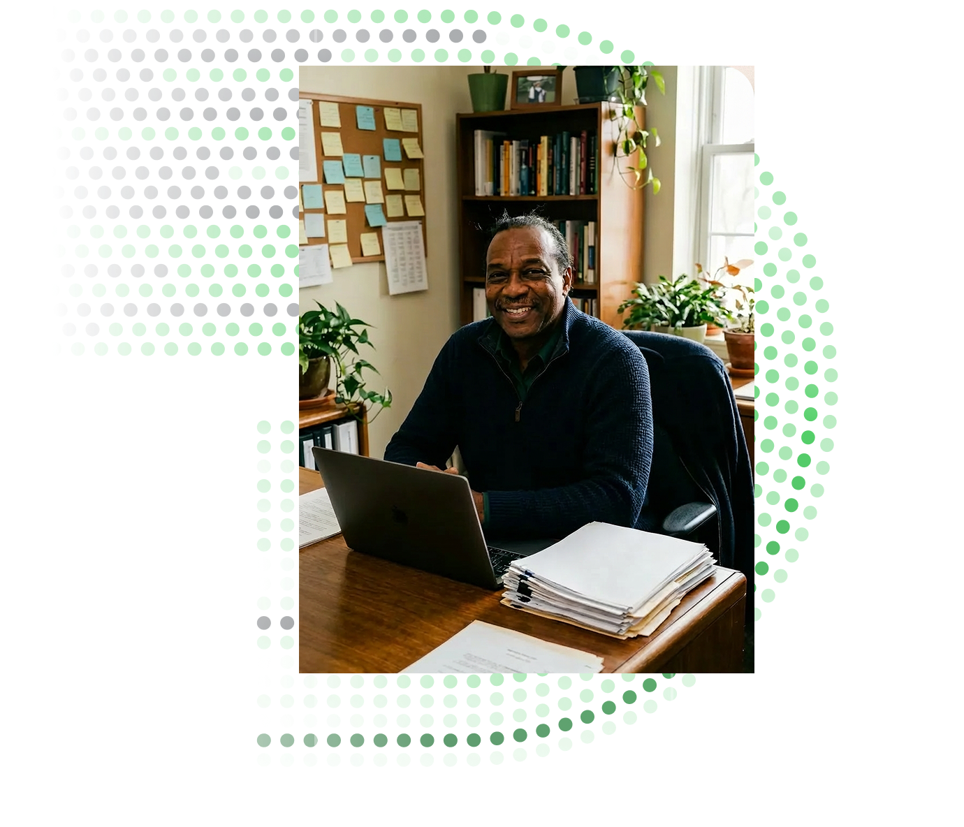 Administrator working on laptop at desk