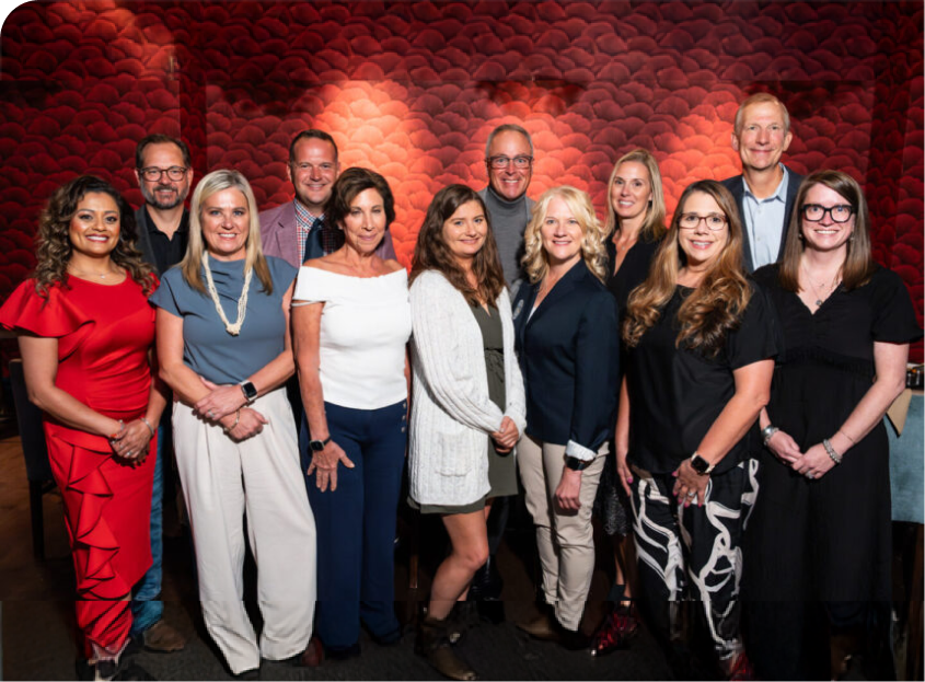 Group photo at McKnights event 2025