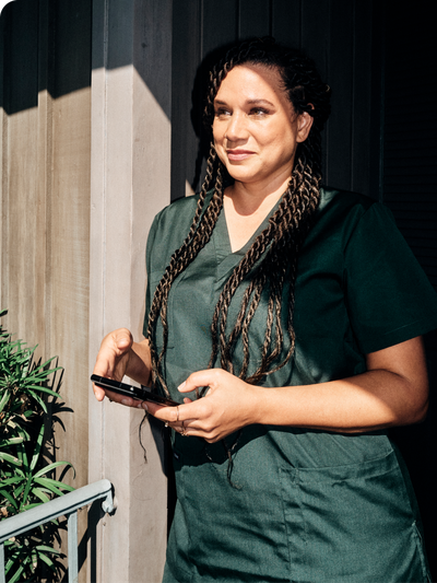 Medical worker holding a smartphone