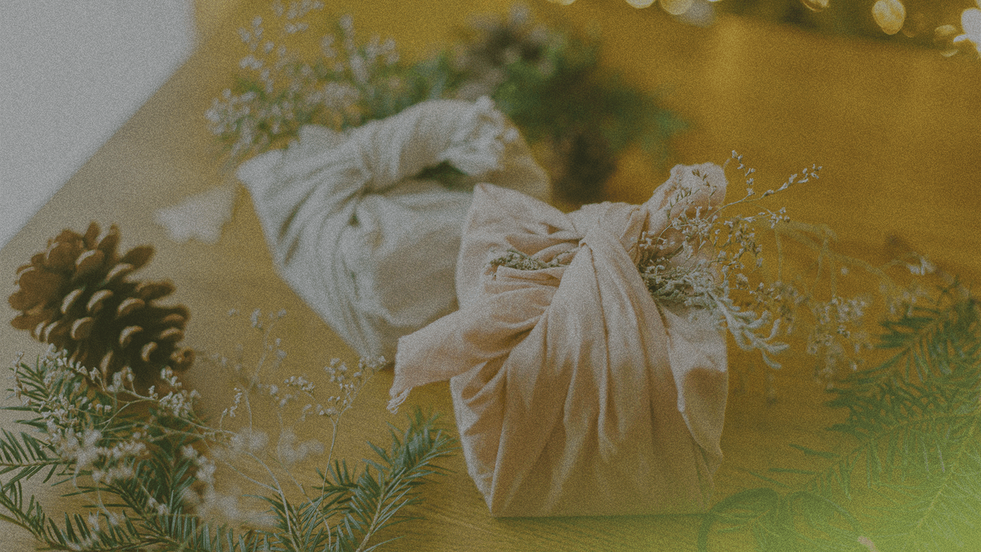 two packages wrapped in cloth instead of wrapping paper