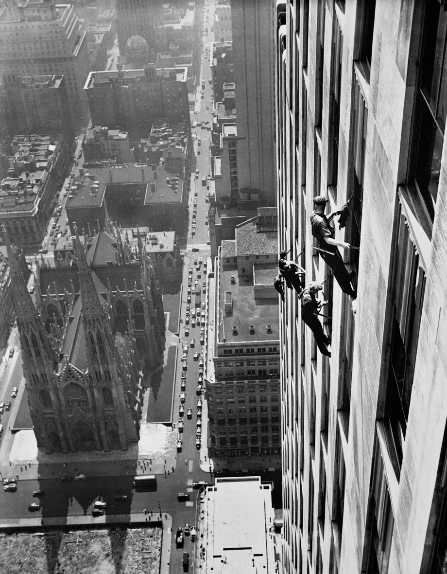 Photo from NYT archives of window cleaners rappelling on skyscraper