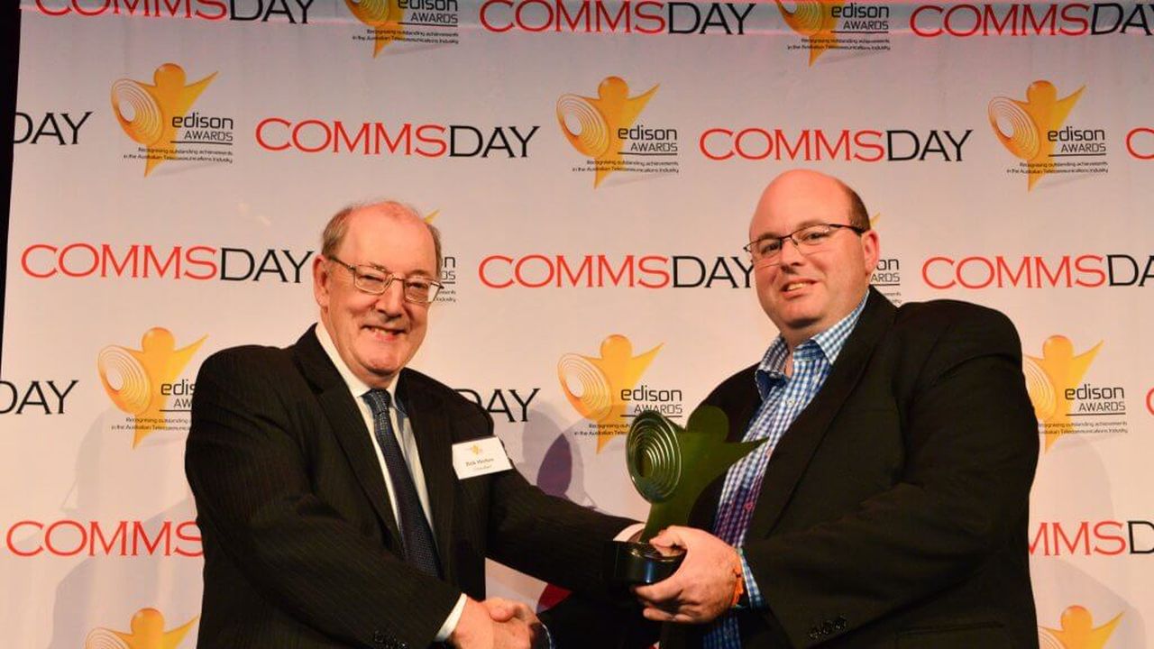 Aussie Broadband Managing Director Phillip Britt accepting the telco industry Edison award 2018