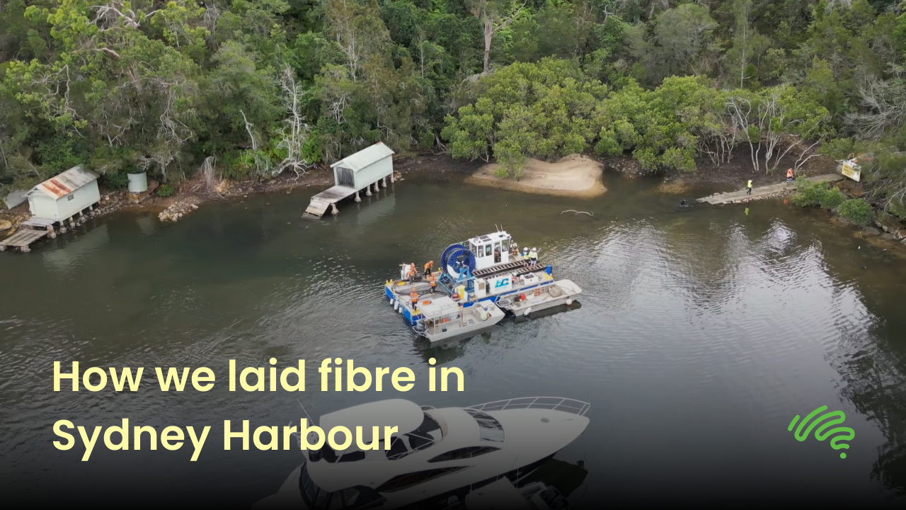 Picture of barge in Sydney Harbour laying fibre-optic cable