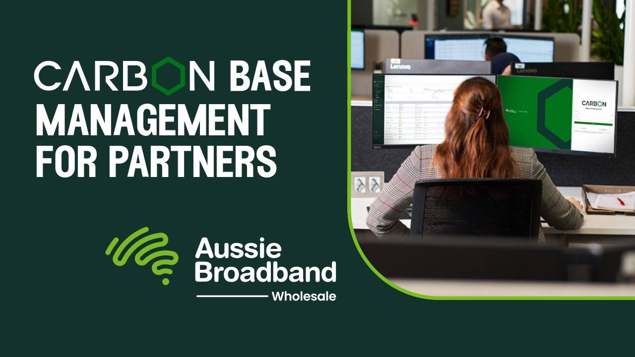 Carbon Base Management for Partners Banner Image with office worker using Carbon on their dual monitor computer screen.