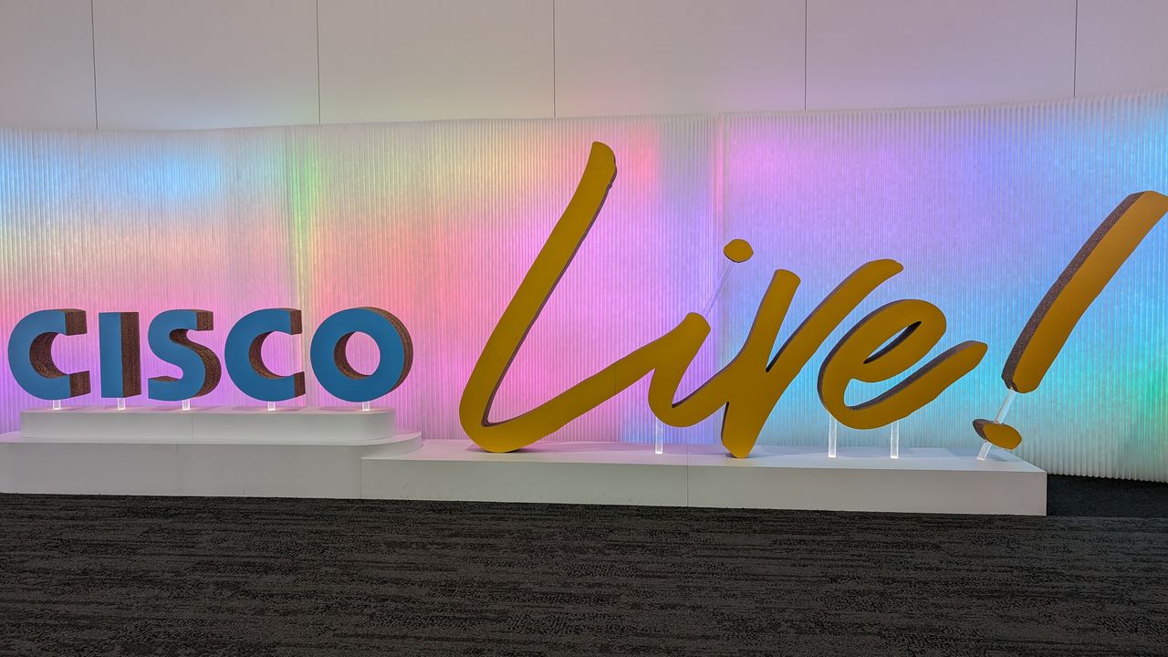 the cisco live 2023 logo. Cisco is written in formal, blue text and live is stylised in larger, more informal font with an exclamation mark at ehe end.