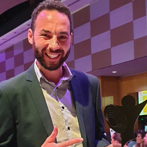 Aussie Broadband's Matthew Kusi-Appauh with the Edison Award for Best Broadband Provider