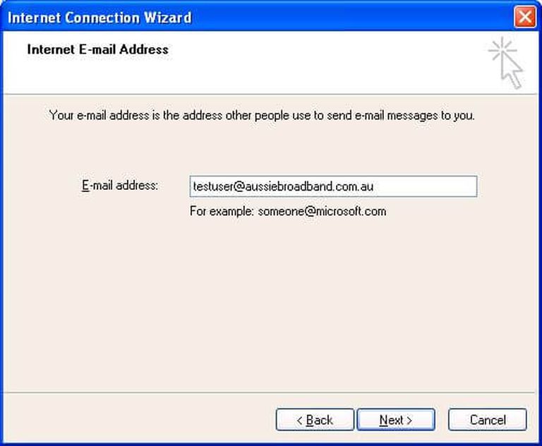 Screenshot of Outlook Express (1996 version) displaying the 'Internet Connection Wizard' window with a field to type in your 'E-mail address'.
