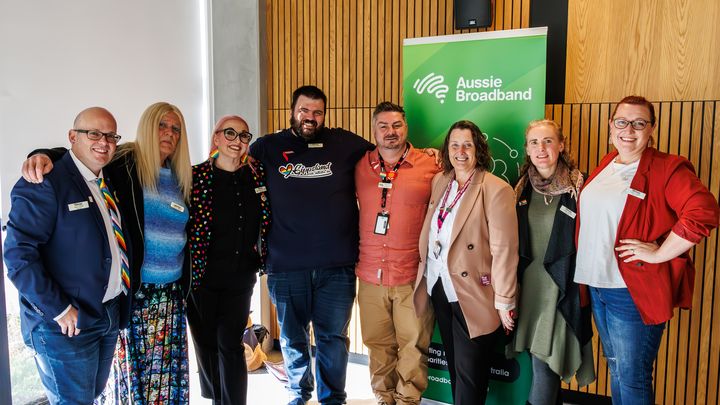 Group of people from Aussie Broadband and the Gippsland Pride Initiative smile as they celebrate the launch of the Rainbow Road Report