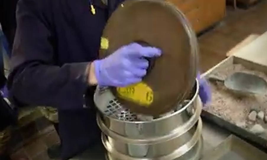 Technician testing construction material in the laboratory