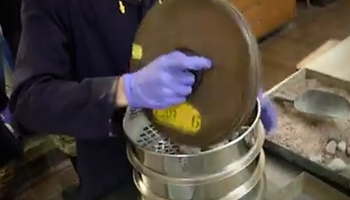 Technician testing construction material in the laboratory