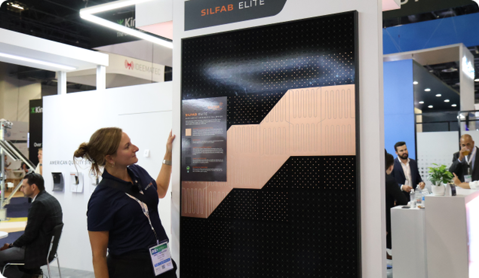 Silfab solar panel with woman inspecting it