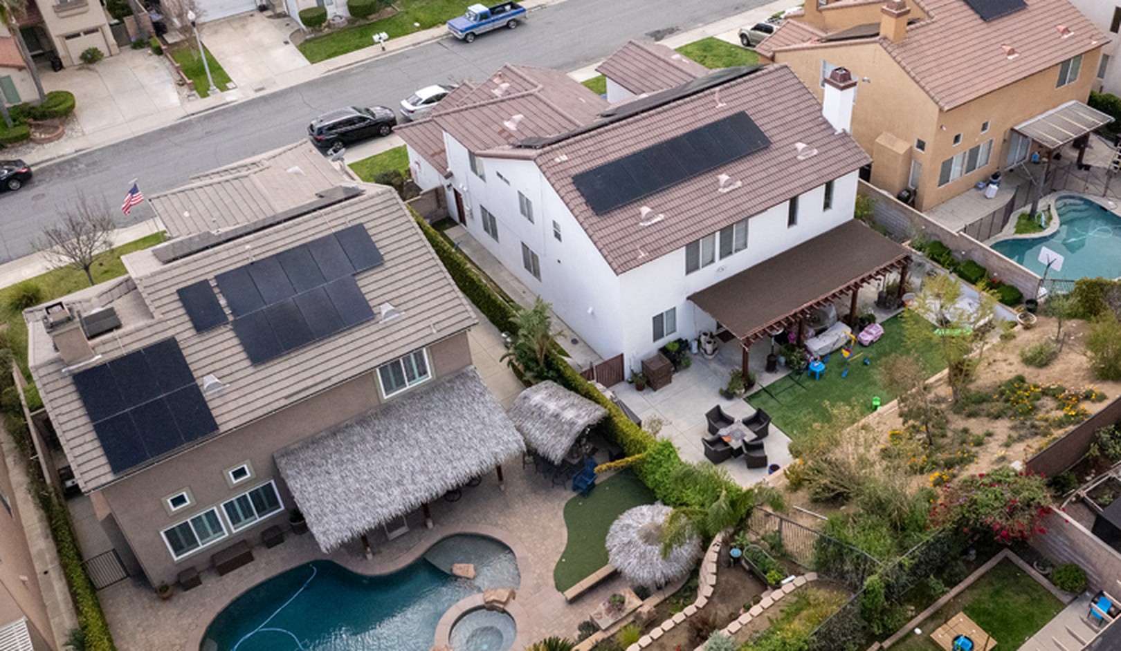 Aerial view of California homes with solar panels on roofs