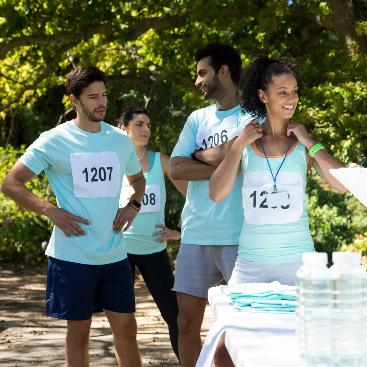 Walkathon participants discuss their per-person fundraising benchmark.