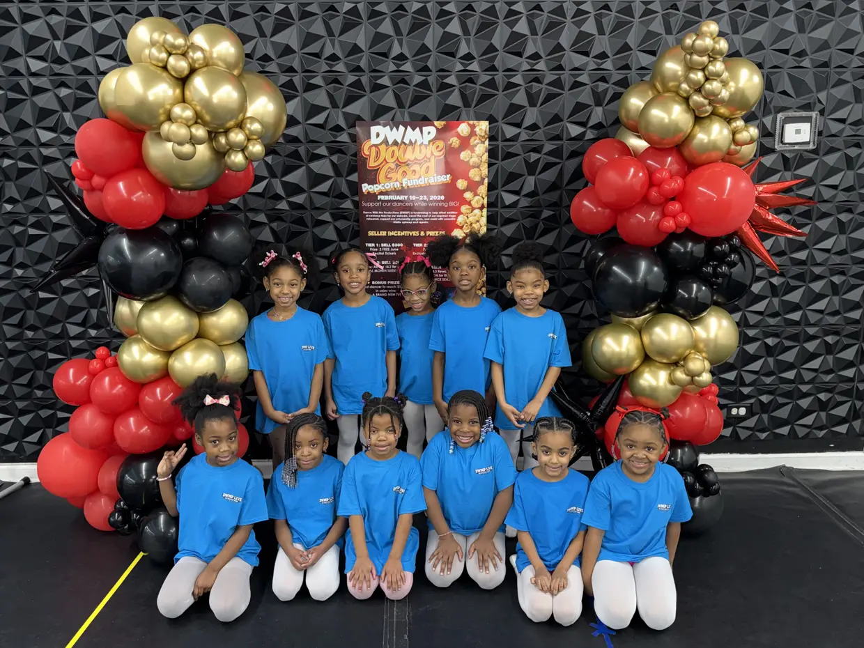 Double Good fundraising participants from Dance With Me Productions posing at their recital.