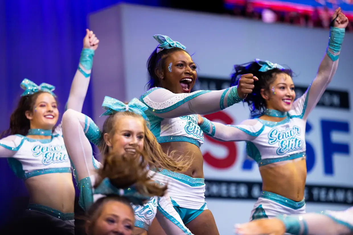 Cheerleading team cheering at competition