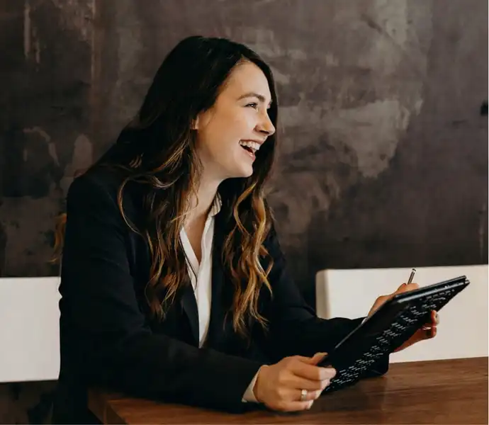 Woman with tablet looking at donation form