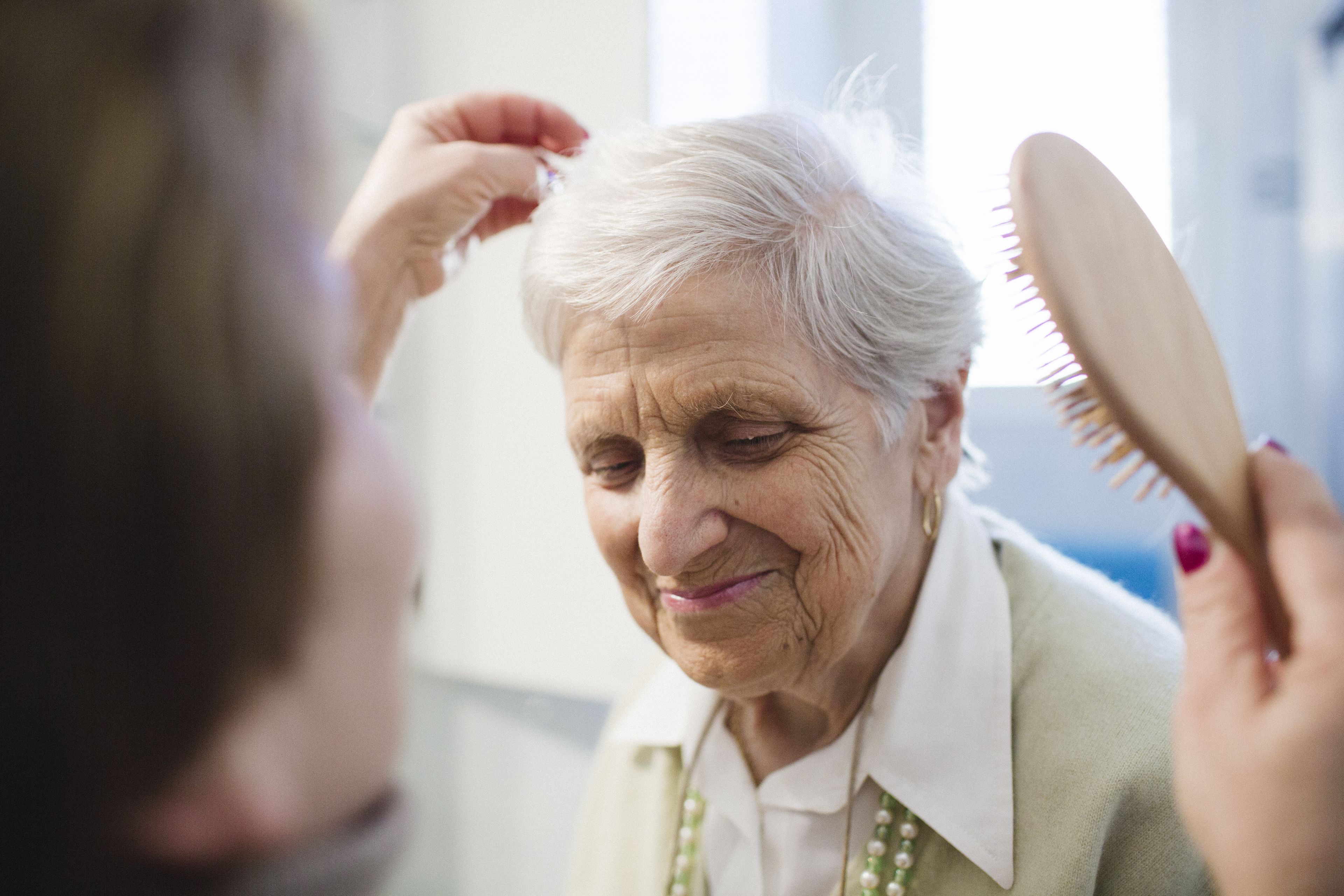 Older Woman Hair Brush