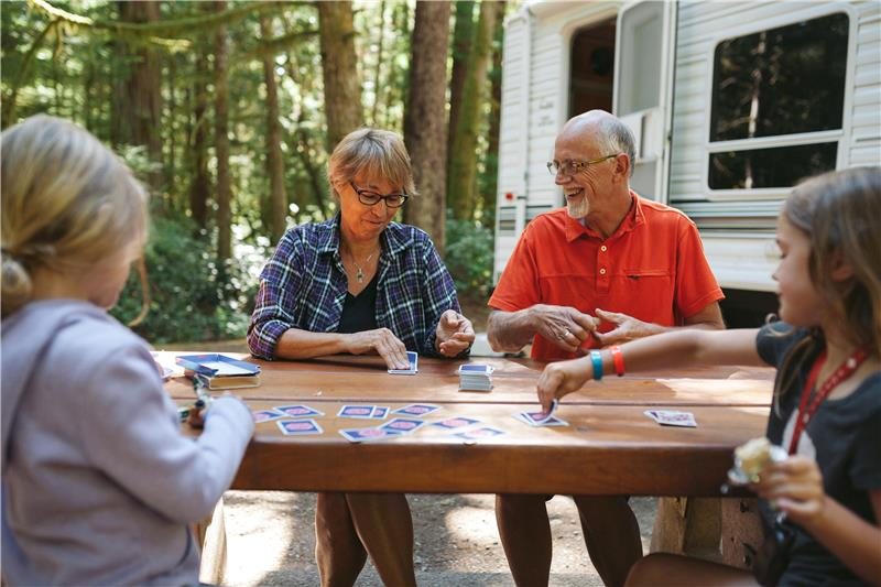 Older Adults Playing Cards at a Table