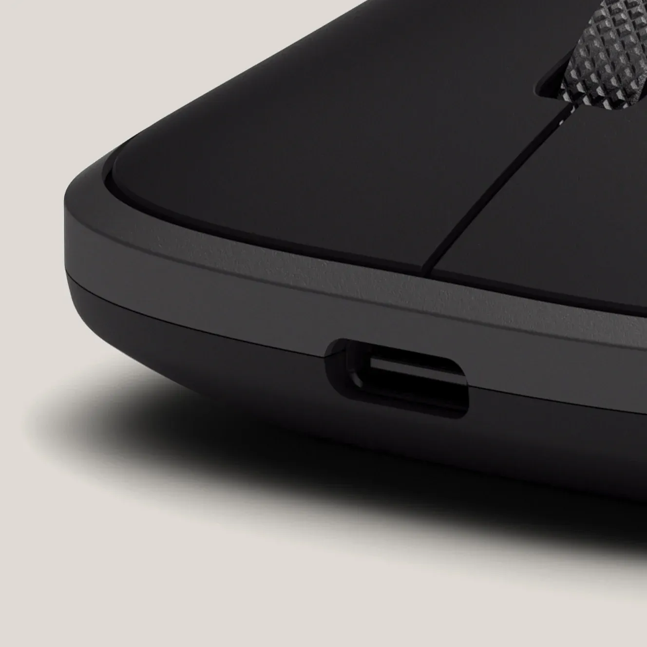 A closeup of a Slim EX Wireless Mouse's USB-C charging port.