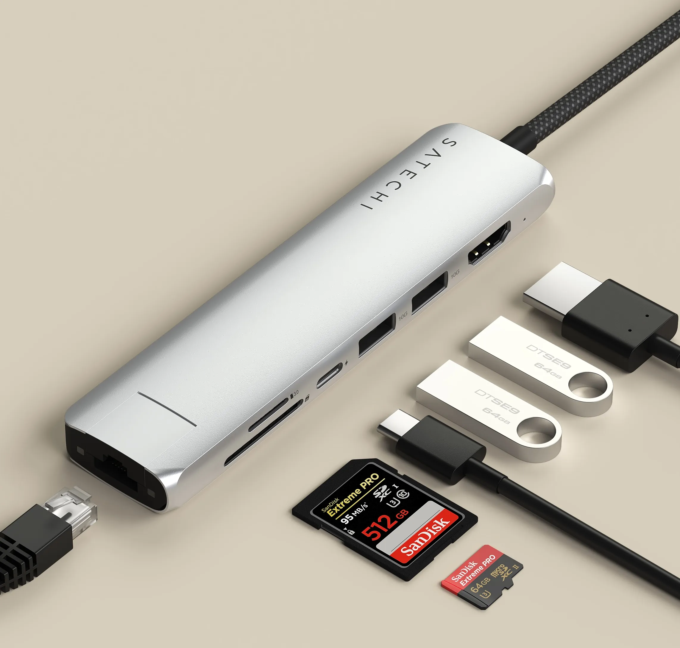 Satechi 7-in-1 USB-C Slim Multiport Adapter with Ethernet, featuring connected HDMI, USB-A, USB-C, and Ethernet cables, alongside visible MicroSD and SD card slots to showcase full port compatibility.