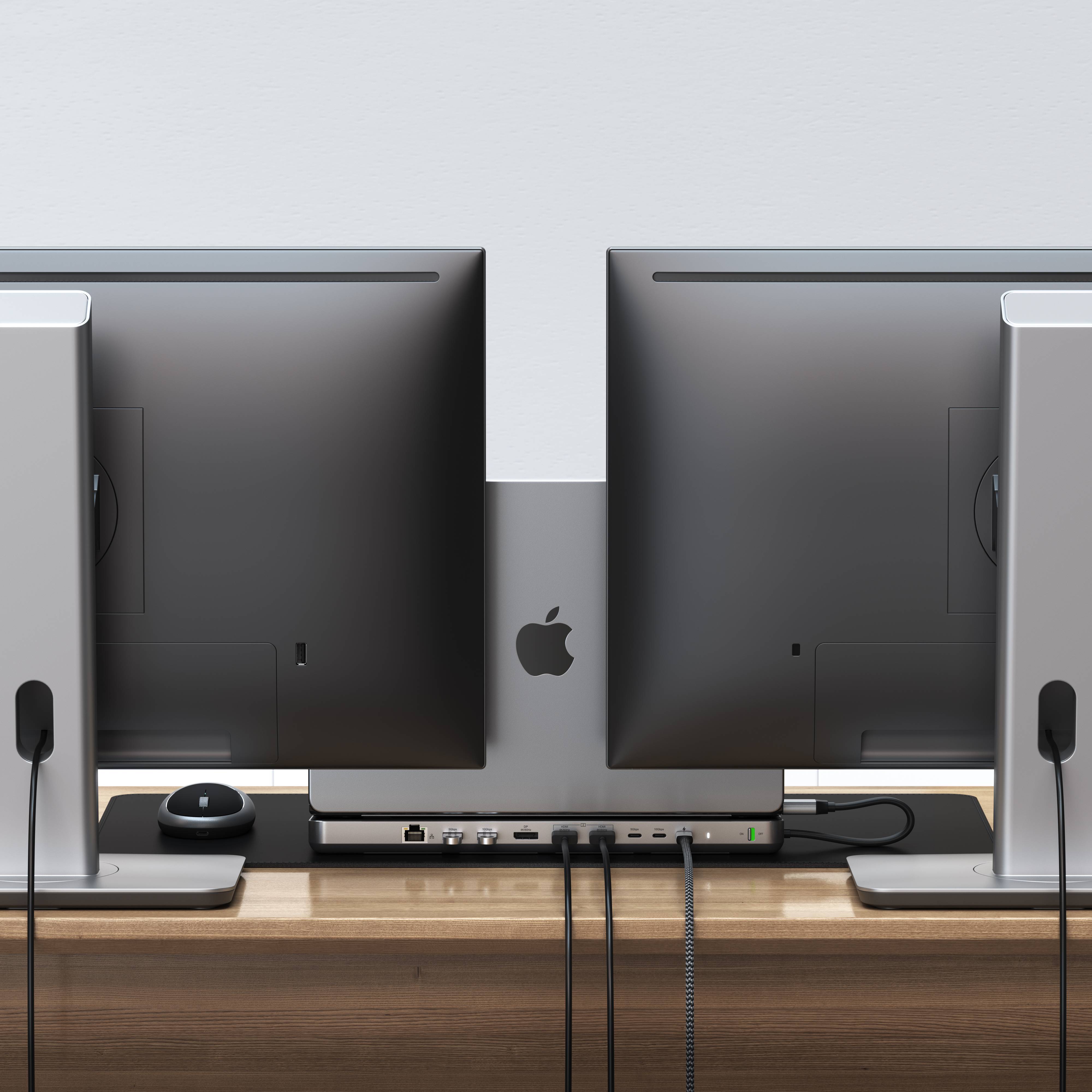 satechi dual dock stand connecting to two external monitors with a macbook pro