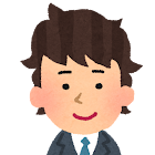 A cartoon of a man with short, dark curly hair in a tie and blazer.