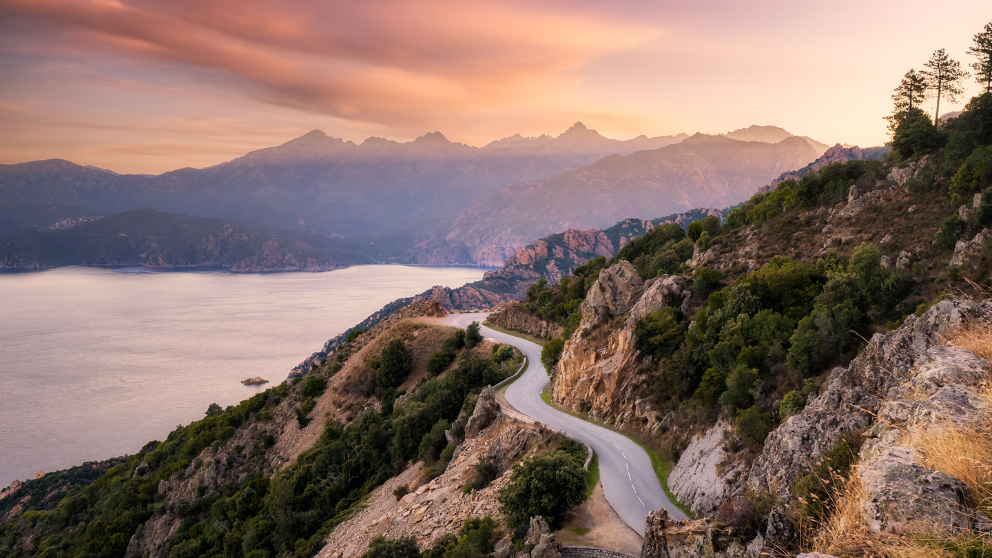 A winding road running along the ocean