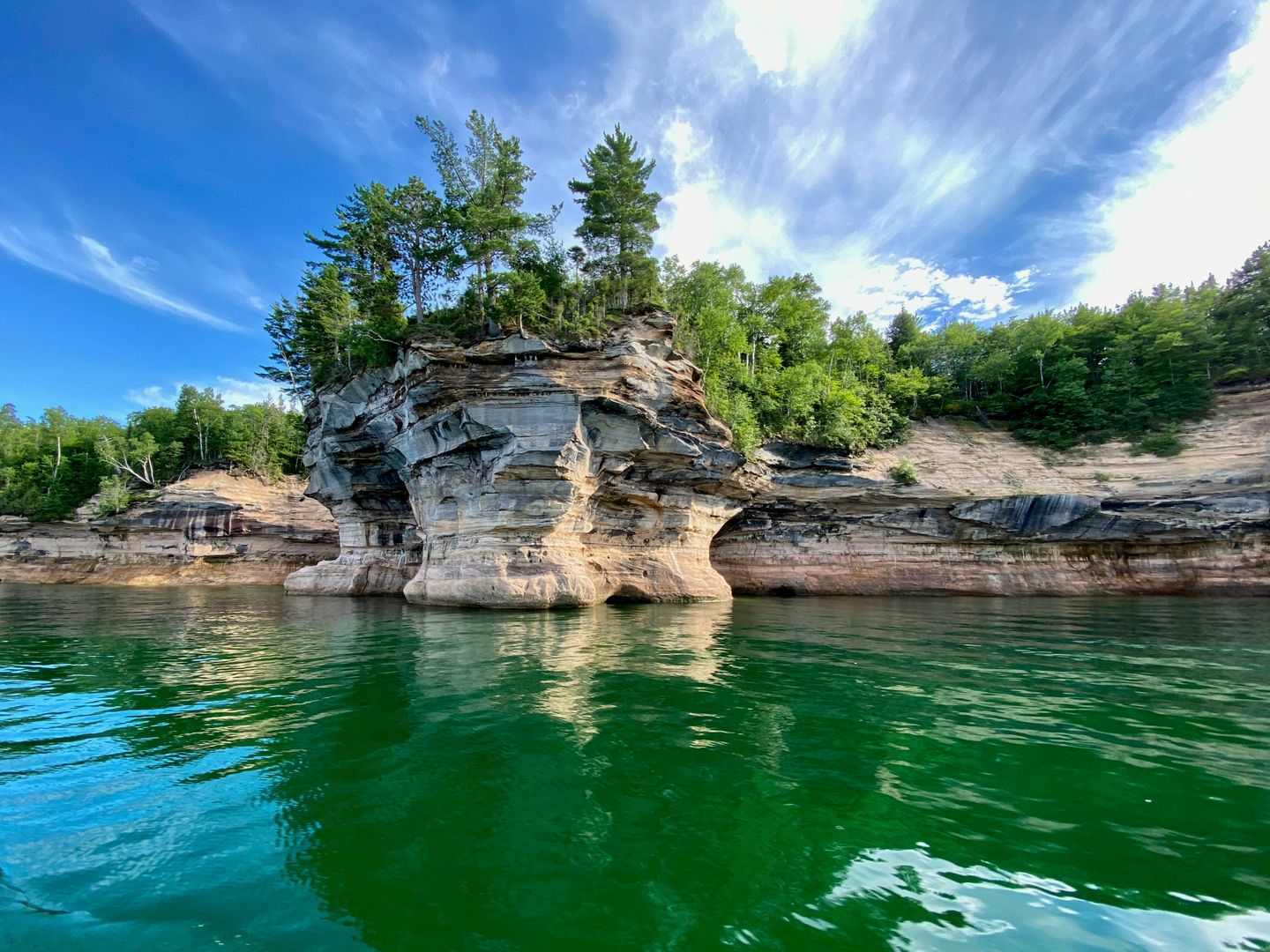 Rock formations shaped like cliffs on Lake Superior in Munising Township, MI, USA