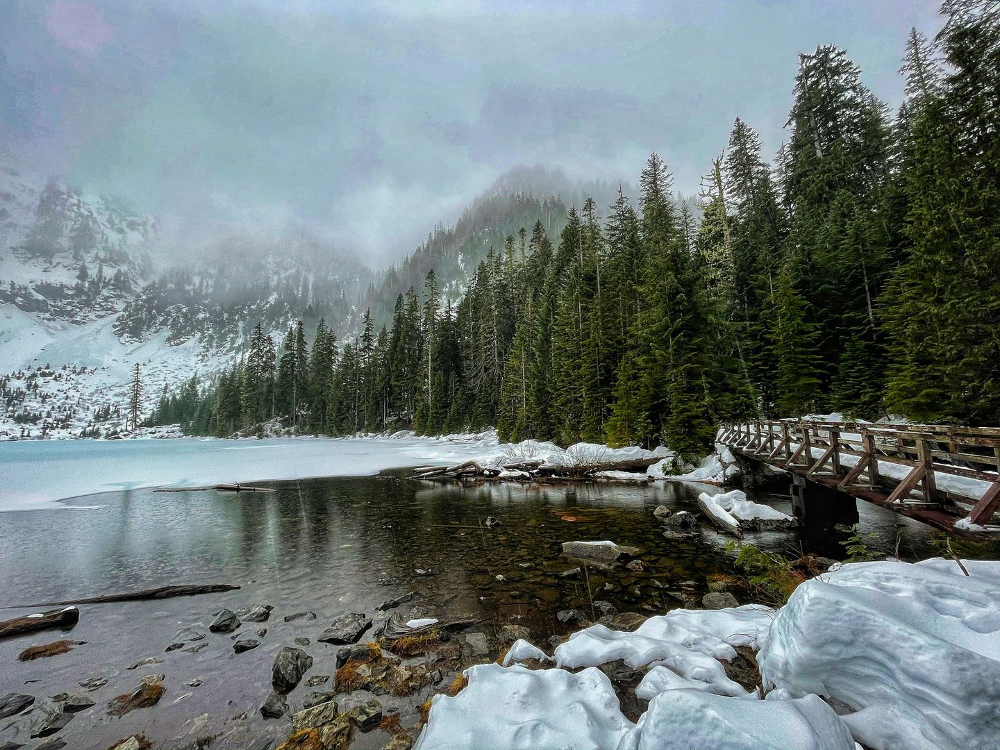 The Mount Baker in Snoqualmie National Forest, Granite Falls, United States covered by snow with evergreen trees