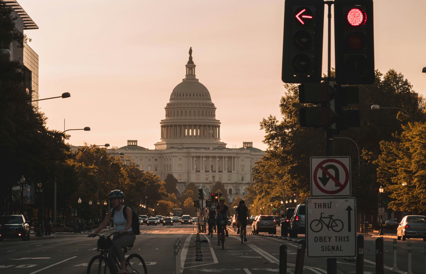 United States Capitol building (a white stone building with a dome) photographed at sunset from First Street Southeast, Washington, DC, USA