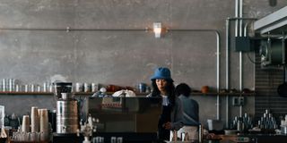 a barista at a Japanese coffee shop