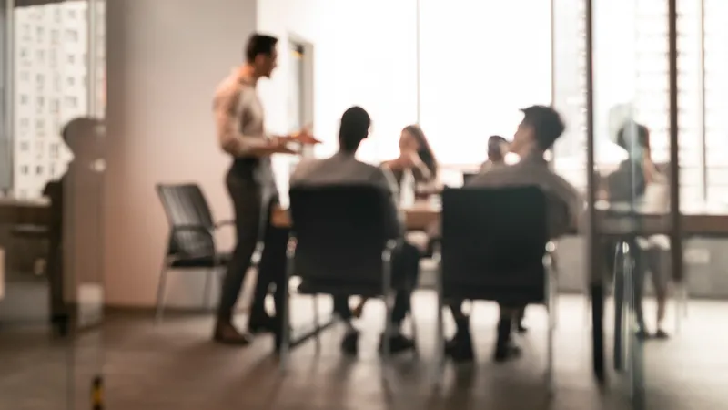 blurry photo of marekting team working on inbound marketing and sales strategies.