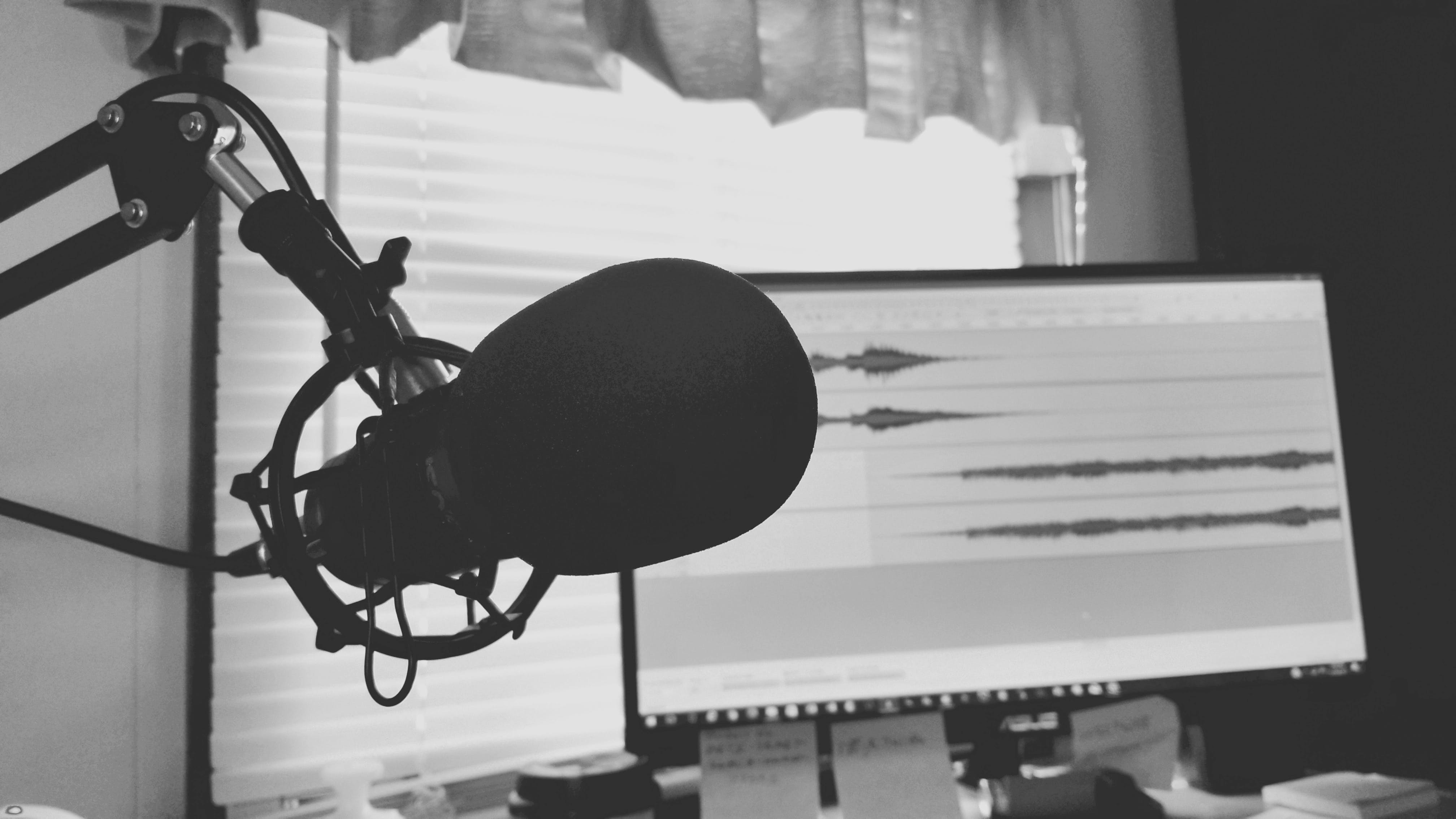 uo close photo of a podcast microphone
