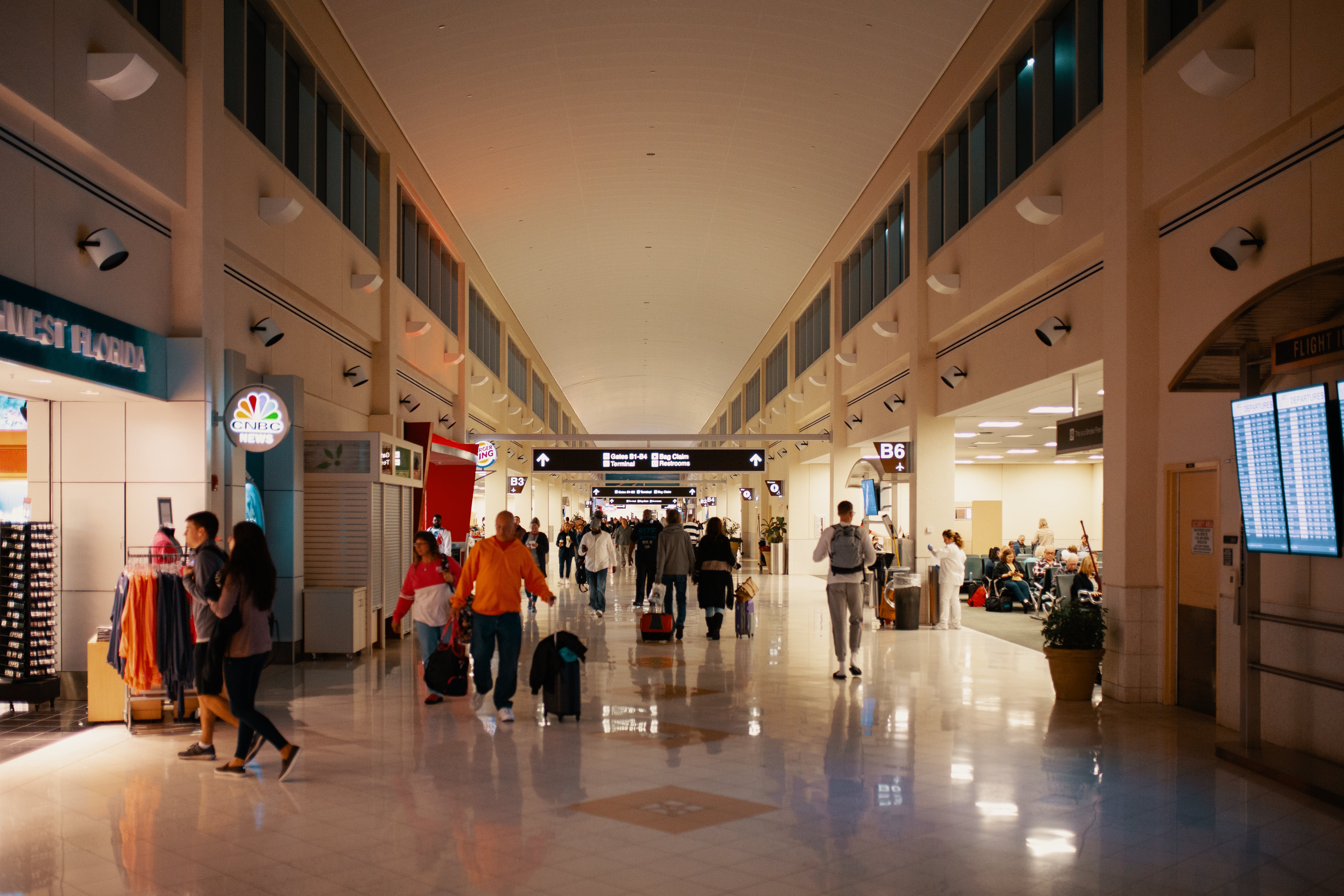 people walking in an airport