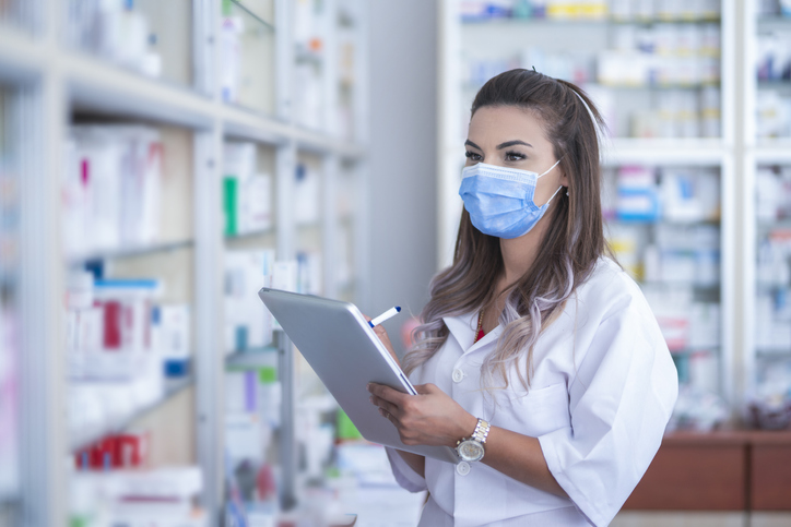 healthcare provider working on an tablet.