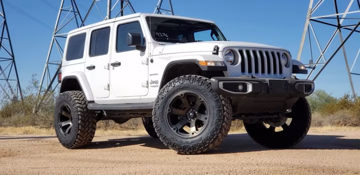 White Jeep Wrangler Unlimited Sahara