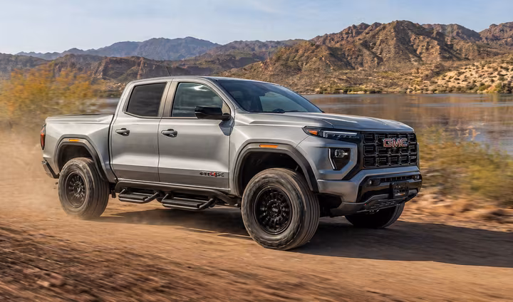 GMC Canyon AT4X by a lake