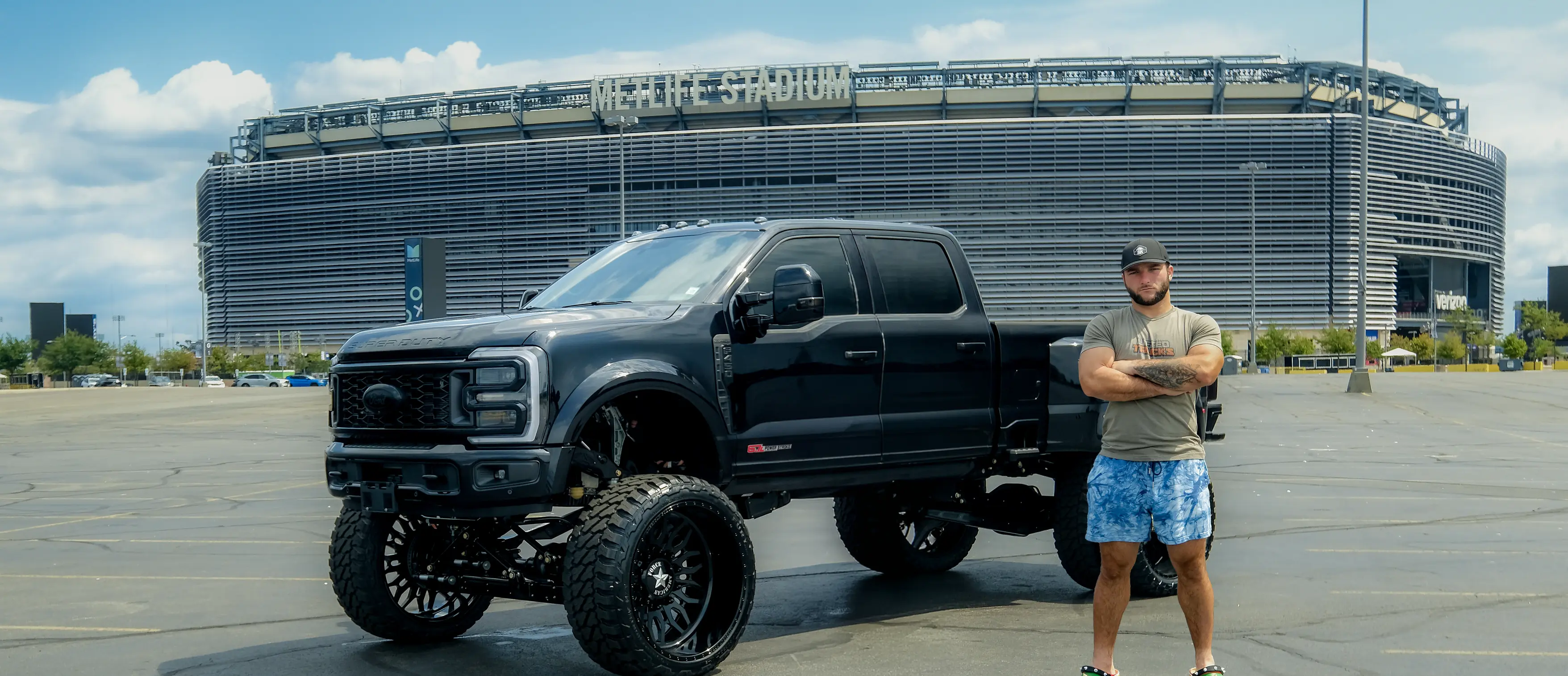 Cam Skattebo at Metlife Stadium by his F-450